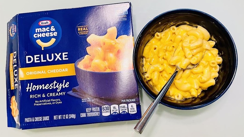 Box of cooked Kraft Original Cheddar Deluxe Macaroni & Cheese