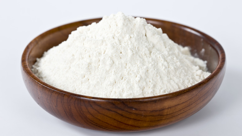 All-purpose flour in wooden bowl