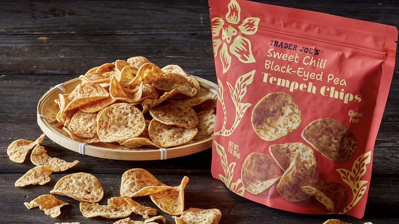 bag of Trader Joe's sweet chili black-eyed pea tempeh chips next to plate of chips