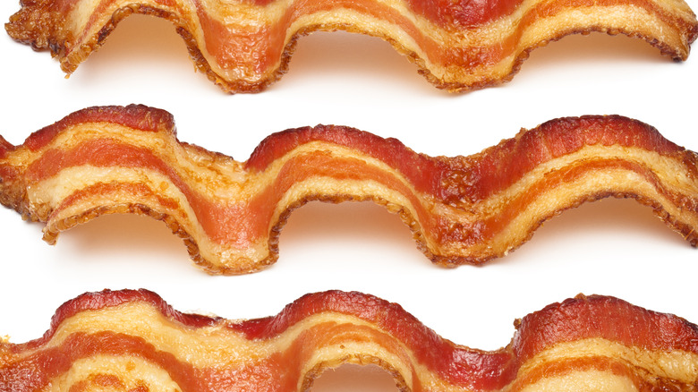 three pieces of fried bacon