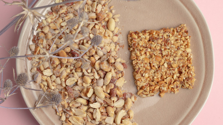 Ghanaian peanut brittle on clay plate