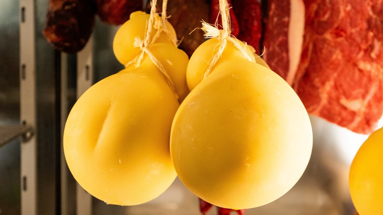 caciocavallo cheeses hanging in pairs