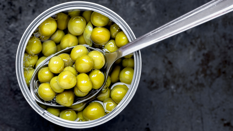 Can of peas with spoon