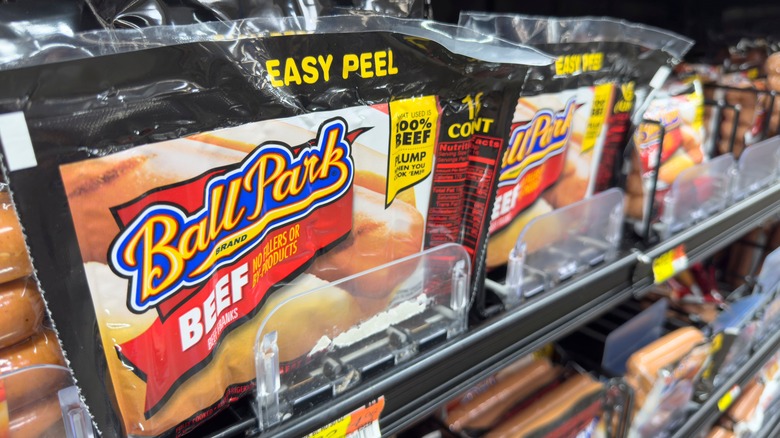Store shelf stocked with Ball Park hot dogs