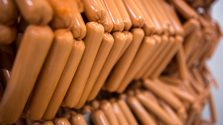 Rack loaded with linked hot dogs