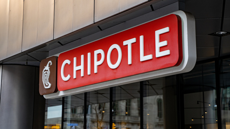 A Chipotle restaurant view from the front on a sunny day
