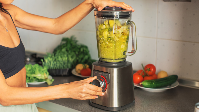 chunky vegetables being blended.