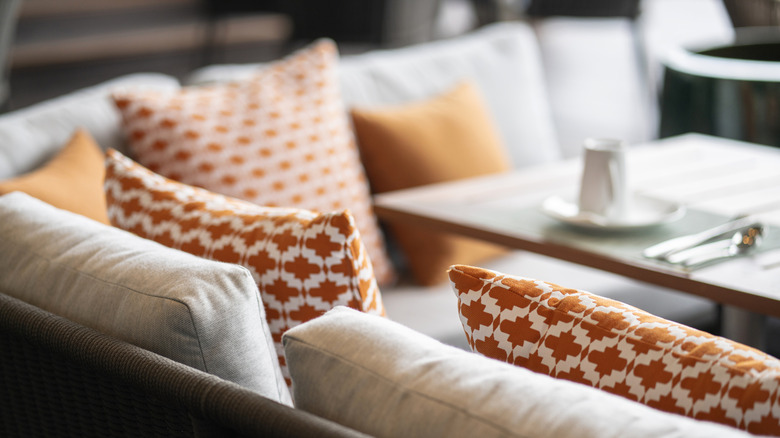 Pillows decorating a restaurant booth.