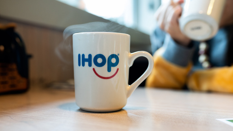 IHOP mug with steam coming out of the top.