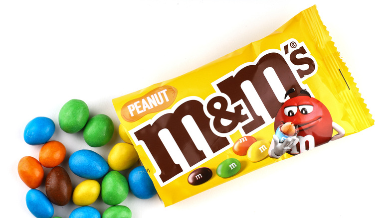 Colorful M&M's candies spilling out of a package