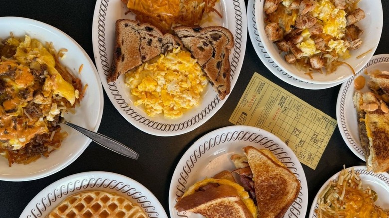Table full of Waffle House breakfast plates