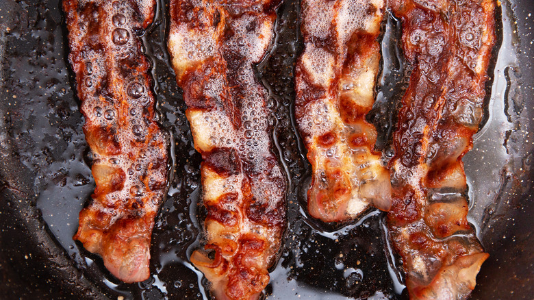 Bacon frying in pan