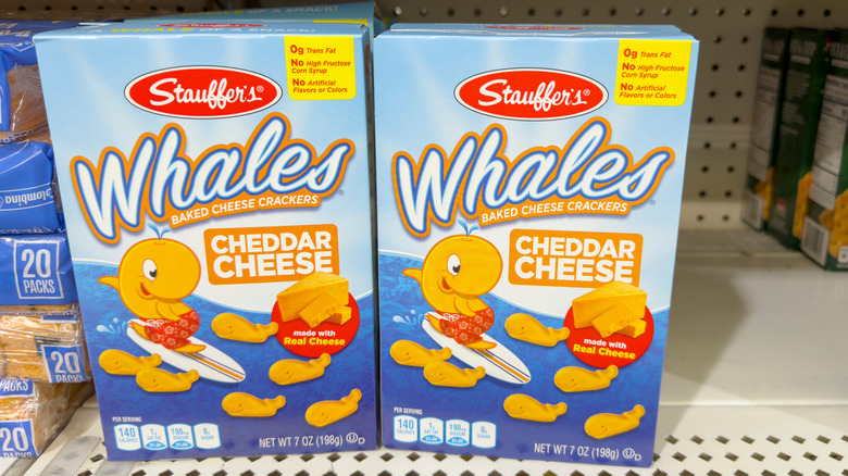 two boxes of whales baked cheddar snacks on dollar tree store shelf