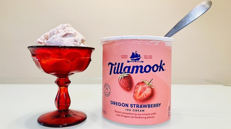 Red dish and carton of Tillamook Oregon Strawberry Ice Cream