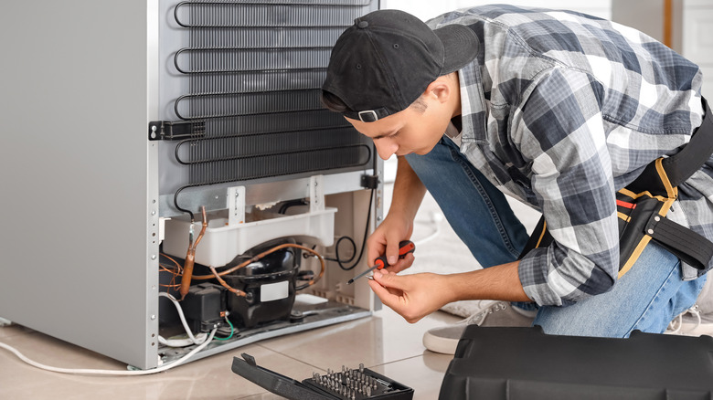 refrigerator repair man tools