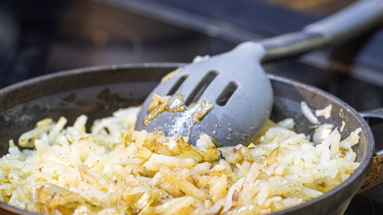 hash browns in a cast iron skillet