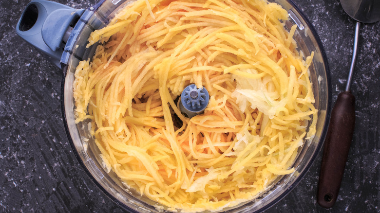 shredded potatoes in a food processor