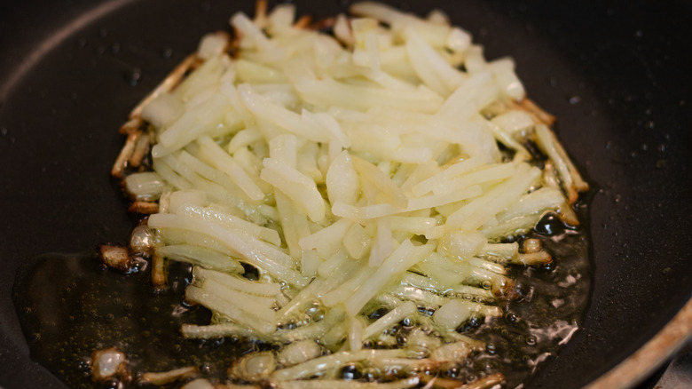layer of potatoes in a pan