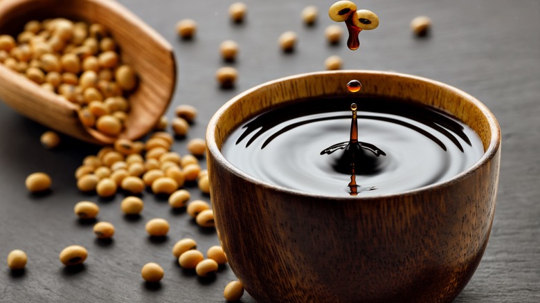 soy sauce in a wooden bowl