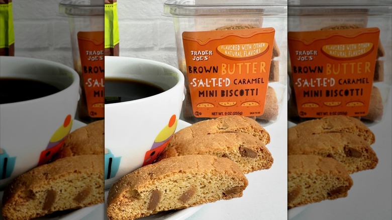 Trader Joe's Brown Butter Salted Caramel Mini Biscotti sit beside a cup of coffee