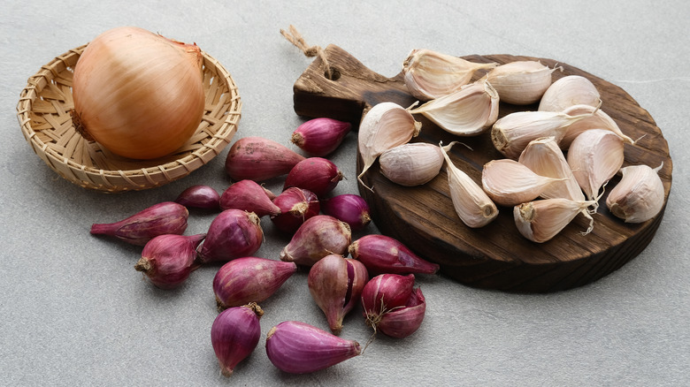 Onion, garlic cloves, and shallots