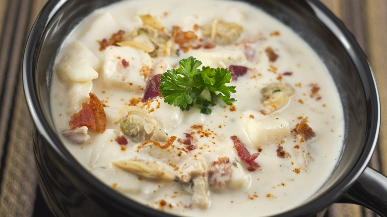 Black bowl of New England clam chowder