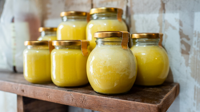 Jars of ghee on a shelf