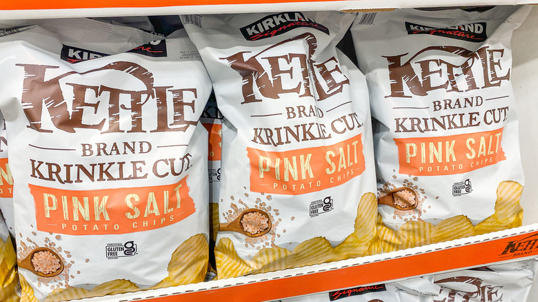 several bags of kirkland signature pink salt kettle chips at costco
