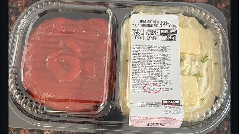 Costco meatloaf and mashed potato's on a brown counter