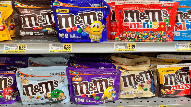 Bags of various M&M's flavors sit on store shelves