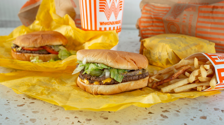Whataburger combo meal with burger, fries, and a drink