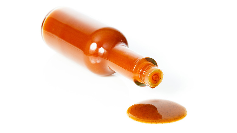 Hot sauce bottle on side
