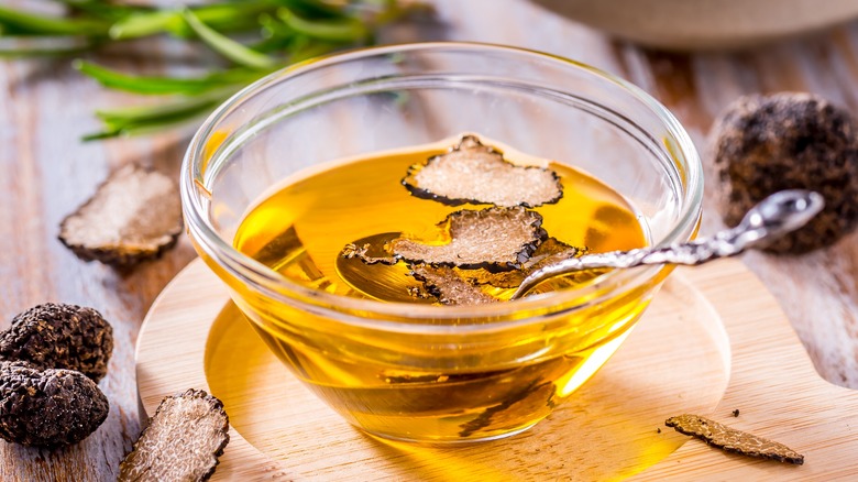 truffle oil in bowl with truffles