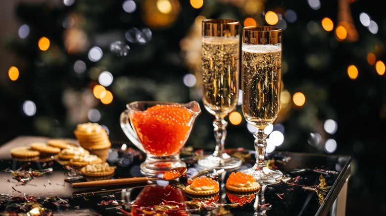 caviar on crackers and champagne