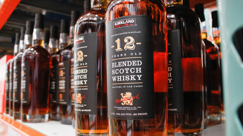 rows of Kirkland Signature 12-Year-Old Blended Scotch Whisky on the shelf