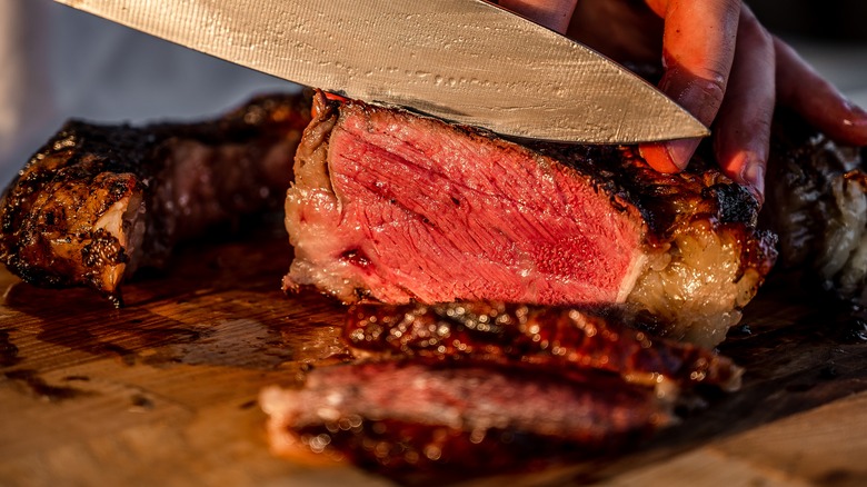 chef slicing steak