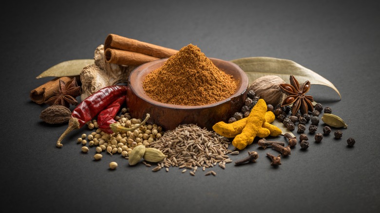 Garam masala spices on a black background