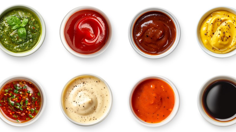 small white bowls of mutiple dipping sauces