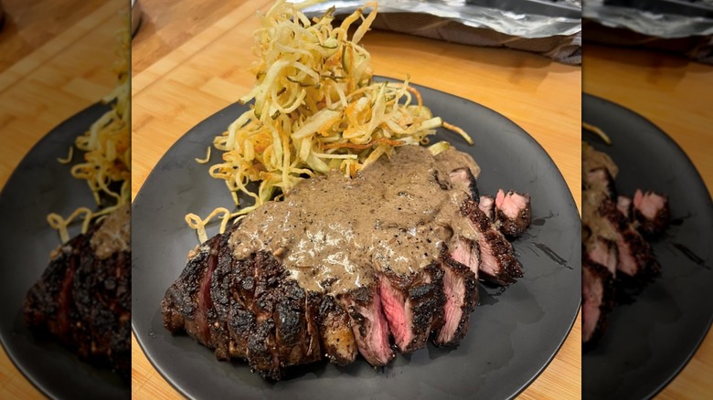 bourbon peppercorn sauce in a pan