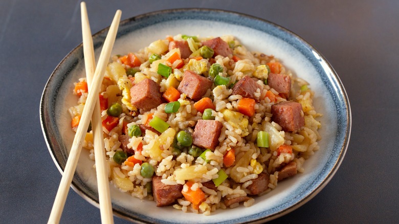 a bowl of spam and fried rice