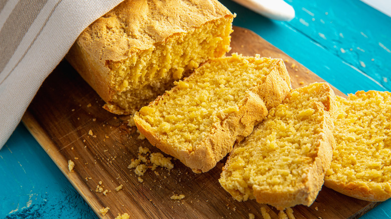sliced cornbread on wood board