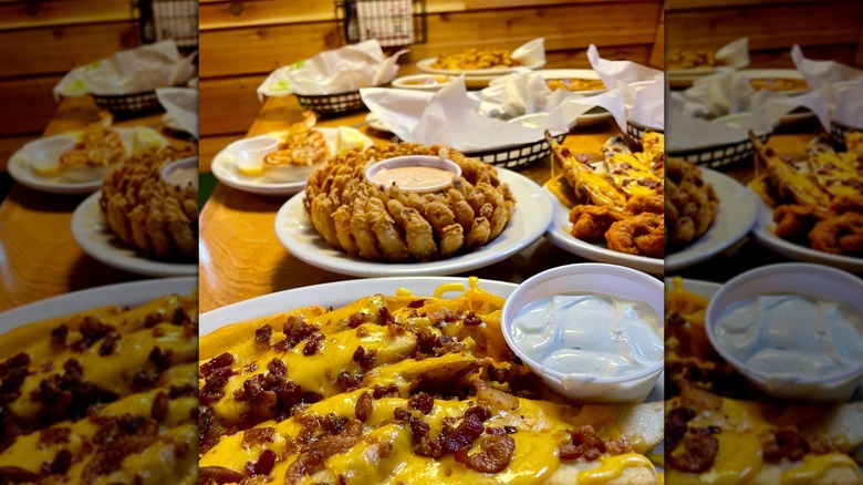 Assorted starters offered by Texas Roadhouse arranged at a booth