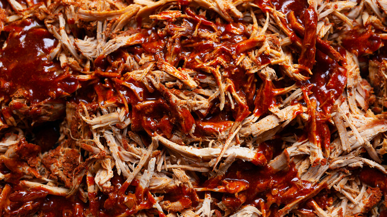 Pulled pork brushed with barbecue sauce