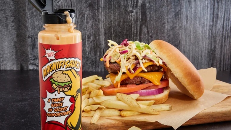 Magnifisauce! from Trader Joe's alongside a double cheeseburger and fries.