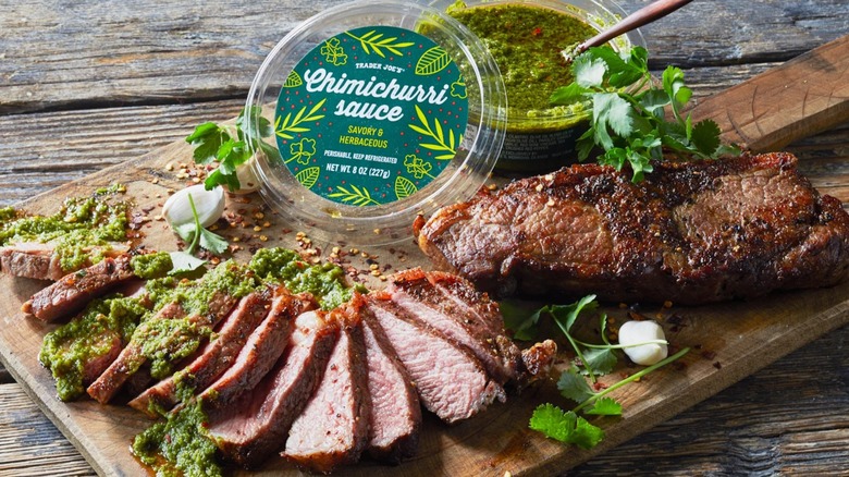 Chimichurri Sauce from Trader Joe's alongside a steak.