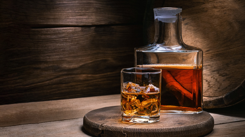  vintage rum glass and bottle