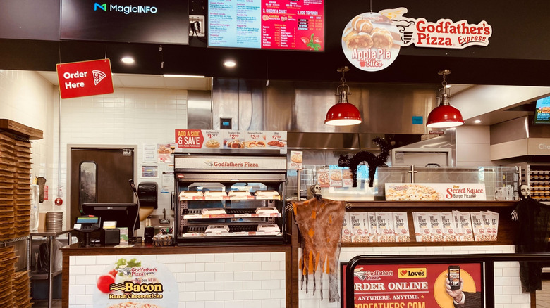 A Godfather's Pizza Express counter.