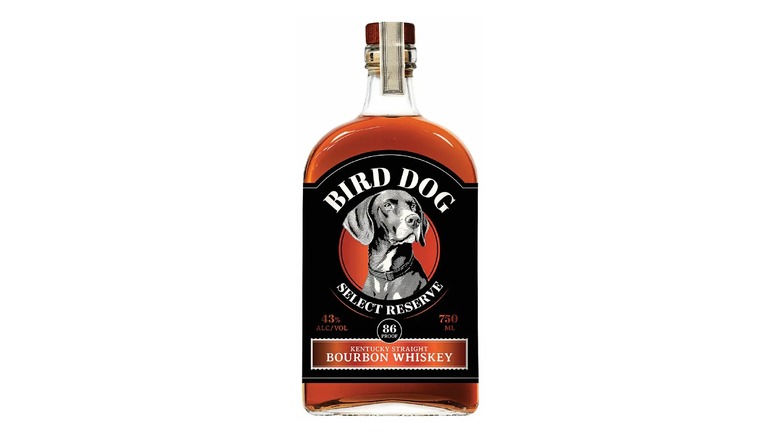 A bottle of Bird Dog select reserve bourbon whiskey.