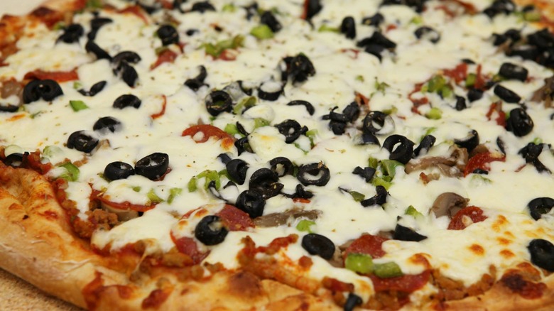 Harris Pizza with various toppings
