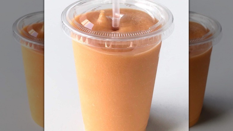 Cup of Costco Japan's orange Cantaloupe Melon Smoothie